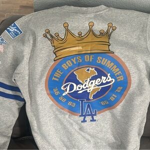 Dodgers sweater paid80 asking $40 Raiders shirt $15 sz M